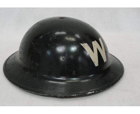 A WWII fire warden's hat; together with a swagger stick