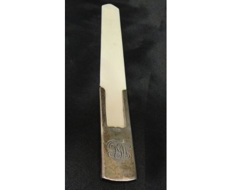 An ivory and silver page turner by the Goldsmith & Silversmith Co London 1913: 'TGW' monogrammed to the handle