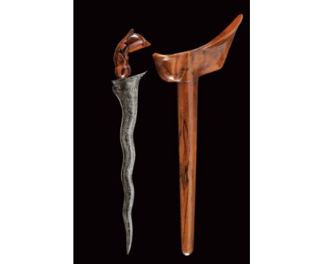 dating: first quarter of the 20th Century provenance: Sulawesi, Undulated, double-edged blade made of fine pamor, carved base