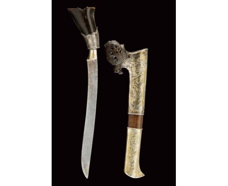 dating: circa 1900 provenance: Sumatra, Single-edged blade. Horn grip with sculpted pommel and base of decorated silver. Wood