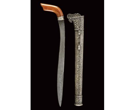 dating: 19th Century provenance: Sulawesi, Almost straight, single-edged blade made of pamor. Wooden, angled and slightly scu