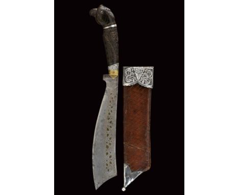 dating: Late 19th Century provenance: Mindanao, Large, single-edged blade rising towards the tip, richly engraved and brass-i