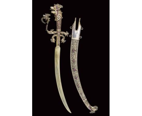 dating: 1910 - 1920 provenance: Ceylon, Flat and thin silver blade. Solid silver hilt with langets between two small arches e