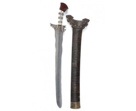 dating: Late 19th Century provenance: Mindanao, Large, slightly curved, double-edged blade (very sharp), undulated and slight