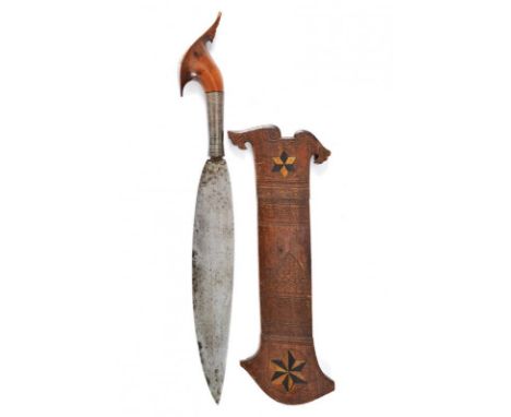 dating: 19th Century provenance: Mindanao, Large and solid, single-edged blade. Sculpted wooden grip (a very small missing pa