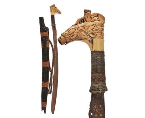 dating: 19th Century provenance: Borneo, Solid and long, curved, single-edged blade with two wings at the back and one at the