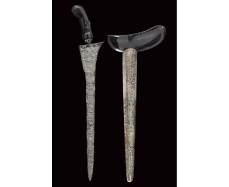 dating: First half of the 20th Century provenance: Giava, Wide, double-edged blades, in fine pamor. Horn ukiran, embossed wit