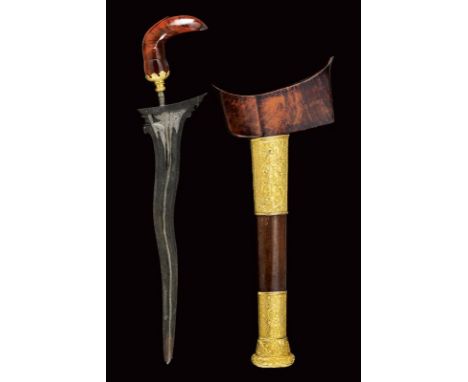 dating: 19th/20th Century provenance: Sumatra, Undulated, double-edged blade with central rib, grooved and carved base (19th 