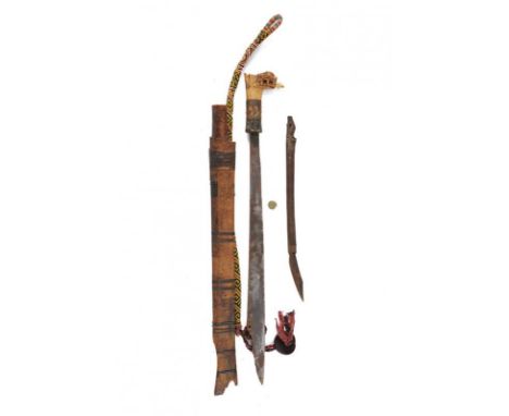 dating: 19th Century provenance: Borneo, Solid, single-edged blade with carvings at the back, towards the weak. Finely carved