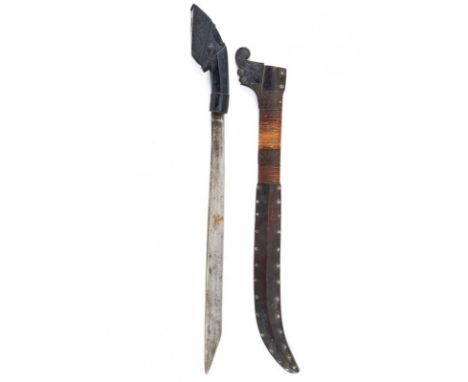 dating: 19th Century provenance: Timor, Straight, iron, single-edged blade with triangular tip. Sculpted wooden grip. Fine sc