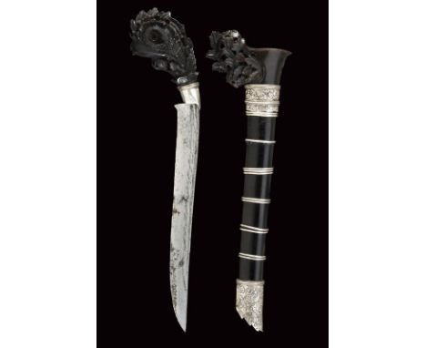 dating: End of 19th beginning of 20th Century provenance: Sumatra, Slightly curved blade, with double grooves near the back. 