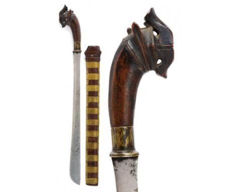 dating: 19th Century provenance: Nias, Single-edged blade increasing towards the weak and with a round tip; wooden hilt with 