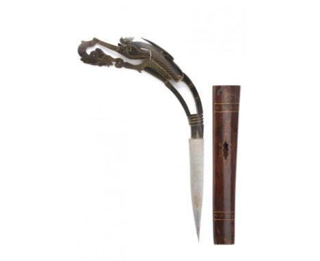 dating: 20th Century provenance: Indonesia, Triangular blade without edge, engraved on both sides with geometric and floral m