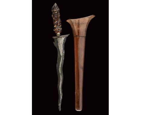 dating: 16th - 20th Century provenance: Giava, Double-edged blade (Java 16th century) made of pamor, with carved base. Deer-h