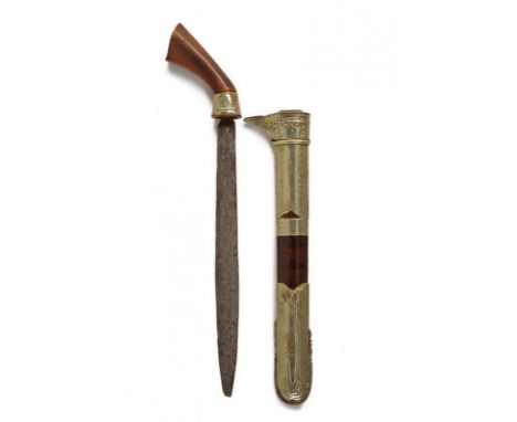 dating: early 20th Century provenance: Sulawesi, Straight blade with remains of pamor. Horn grip featuring silver ring-nut wi