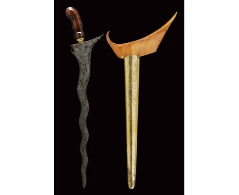 dating: about 1870 provenance: Yogyakarta, Undulated, double-edged blade made of very fine pamor, carved base with short full