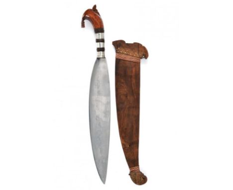dating: 19th Century provenance: Mindanao, Large and solid, single-edged blade. Elegant briarwood grip (small cracks) with fi