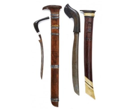 dating: circa 1900 provenance: Sumatra, Strong, slightly-curved, single-edged blade. Angled, wooden grip. Wooden scabbard wit