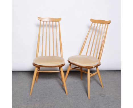 Ercol, a set of four 'Goldsmith's' dining chairs, shape 369, applied blue gilt label, with loose seat pads, seat width 43cm, 