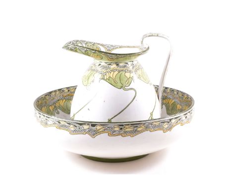 Doulton Burslem, a 'Kelmscot' Series ware jug and wash basin, circa 1900, decorated in the Art Nouveau style, factory backsta