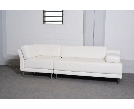 A Habitat leather sofa, Scala design, in two sections, white leather upholstery raised on chromed supports, length 240cm, dep