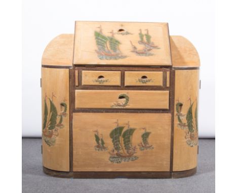 Art Deco bureau, fall front and panels carved with Eastern sailing scenes, the fall front enclosing fitted interior, flanked 