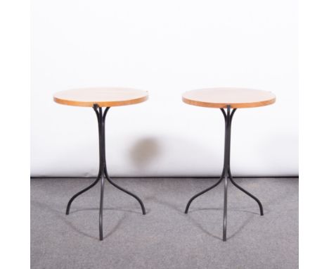 Pair of contemporary hardwood and iron pedestal tables, circular tops raised on tripod supports, diameter 45.5cm, height 64cm