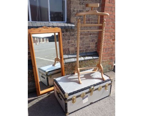 A PINE FRAMED MIRROR a beech dressing stand and an aluminium trunk 
