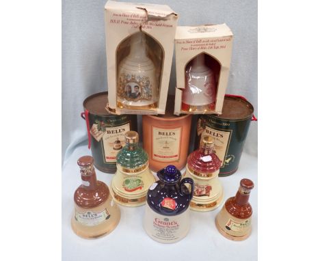 A COLLECTION OF BELL'S DECANTERS including Christmas 1990 (9) all full (note packaging worn and dirty) and a Grant's Scotch