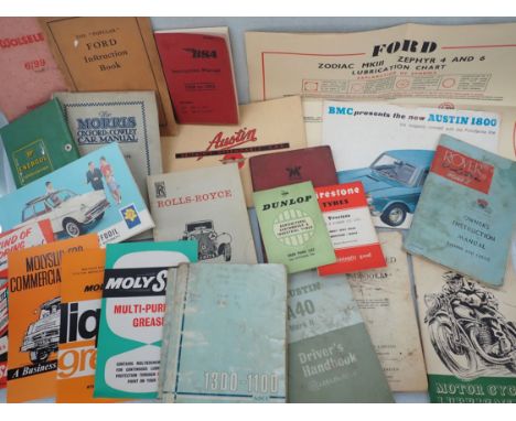 A COLLECTION OF VINTAGE CAR MANUALS and other automobilia