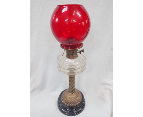 A VICTORIAN OIL LAMP (burner converted to electricity)