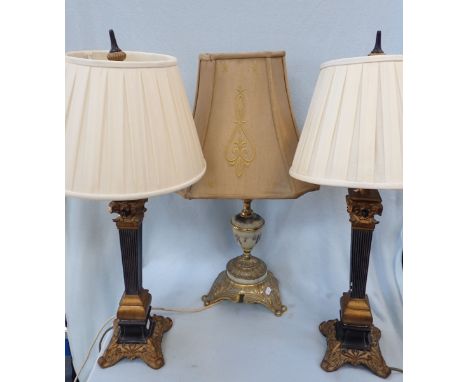 A PAIR OF TABLE LAMPS of square neoclassical column form, 76 cm high, including shade fitting, and one other lamp (small chip