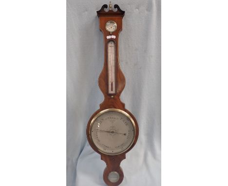 A GEORGE III MAHOGANY WHEEL BAROMETER engraved 'Lione 14 Brooke Street Holborn'