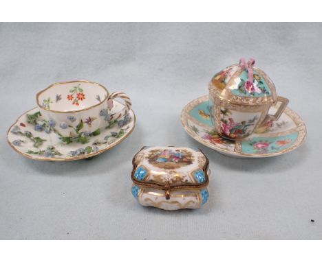 A 19TH CENTURY MEISSEN CUP AND SAUCER with applied flowers and painted insects (damaged), a Helena Wolfsohn style cup and sau