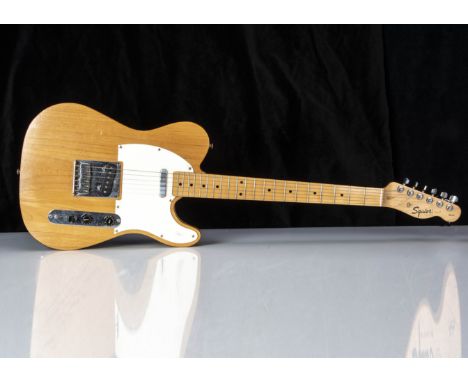 Squier Electric Guitar / Amplifier / Leads, a Squier Tele Electric Guitar, natural wood s/n CY01101522, generally good condit