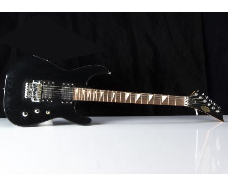 Stagg Electric Guitar, a Stagg Electric Guitar, black, couple of bumps and minor scratches mainly to reverse comes with a Yam