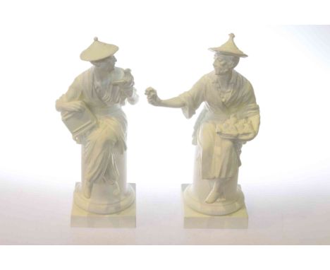 Pair Royal Worcester Oriental figures by A. Azori, L'Oiseau and Le Panier
