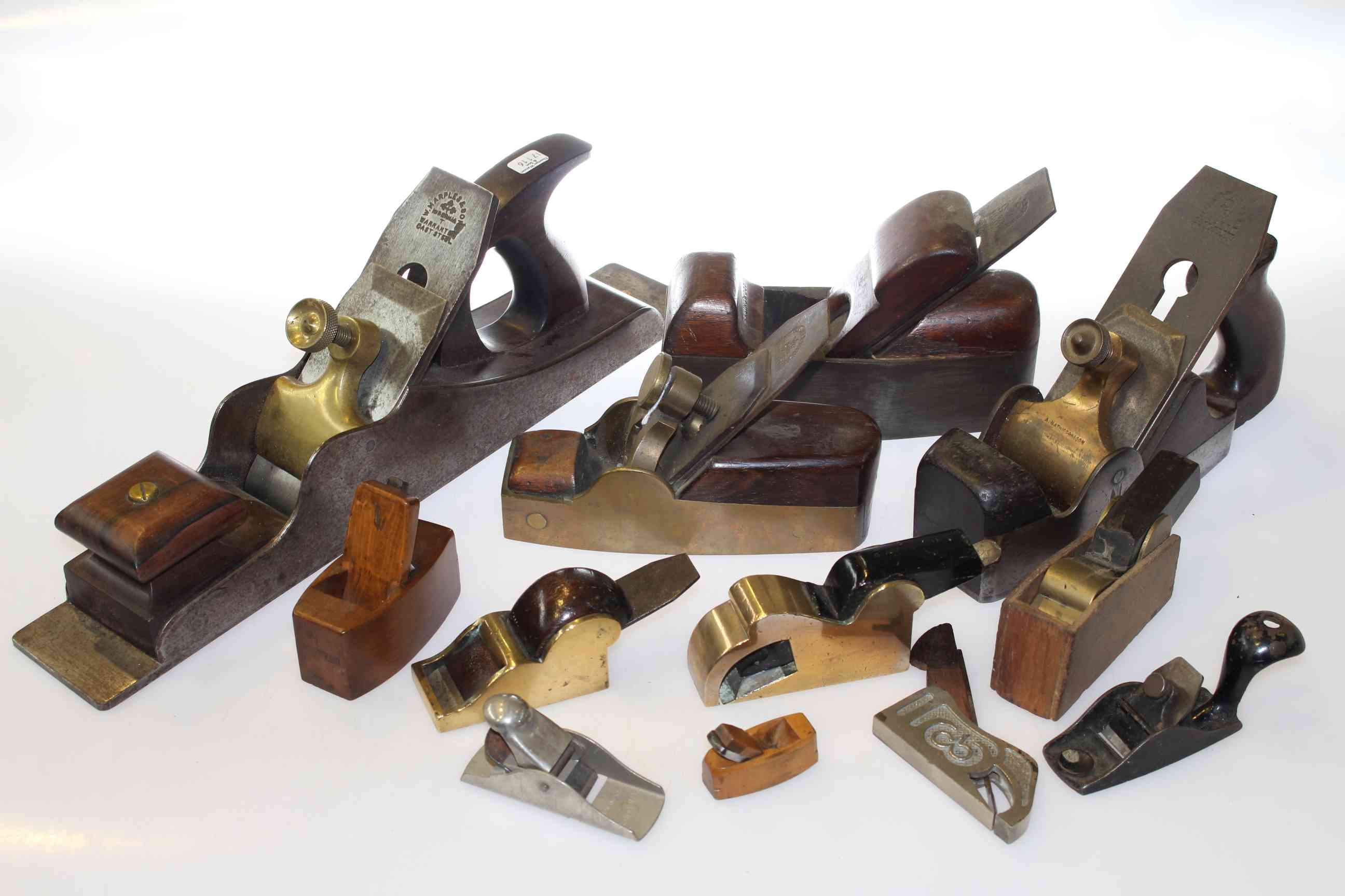 Collection of twelve wood planes of varying sizes