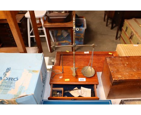 A set of mahogany and brass scales and weights
