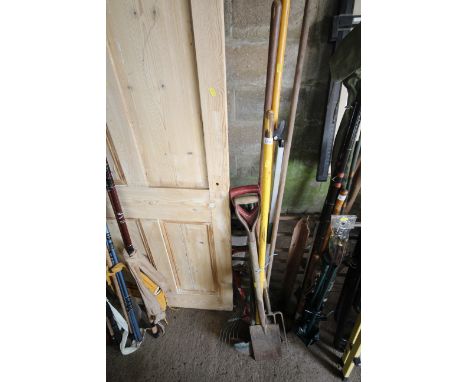 A quantity of long handle gardening tools, including digging spades, fork, rake, hoe etc