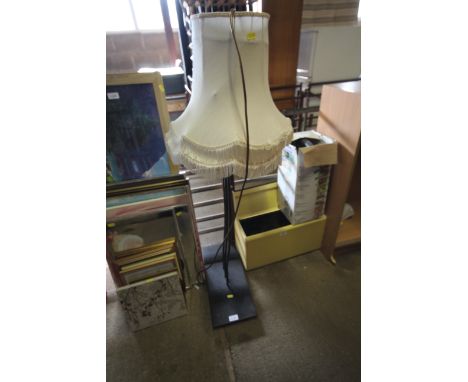 A free standing lamp and shade