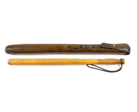 An Early 20th Century Mounted Police Baton, of plain undecorated form, in light stained oak, with ribbed grip, the pommel lat