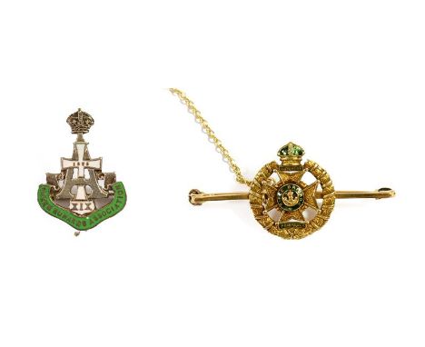 A First World War 15 Carat Gold and Green Enamelled Sweetheart Brooch to the Rifle Brigade, marked C.P.&amp; Co., with safety