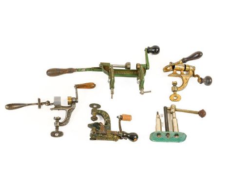 A Collection of Reloading Equipment, comprising a 12 bore capper/decappper, a cartridge crimping tool and three roll turnover
