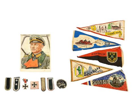 A German Third Reich Iron Cross, second class, the suspender ring stamped 4; a German Third Reich Iron Cross, first class, th