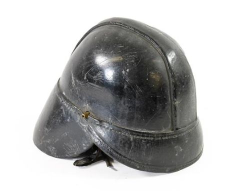 A British Inter-War Period Airfield Fireman's Leather Helmet, the skull with slightly raised leather comb, stitched rounded p