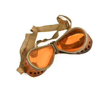 A Pair of First World War Pilot's Goggles, with orange tinted lenses, white metal frames, rolled leather hinge, pierced leath