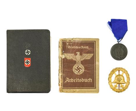 A German Third Reich SS Four Year Bronze Service Medal, with oblong suspender loop and blue ribbon, lacks case, A German Thir