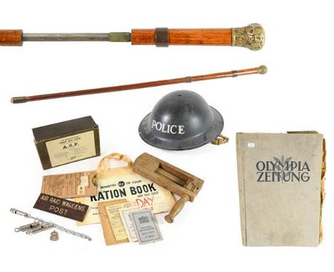 A Collection of Second World War Civil Defence Related Items, comprising a Police Brodie helmet, two boxed respirators, a box