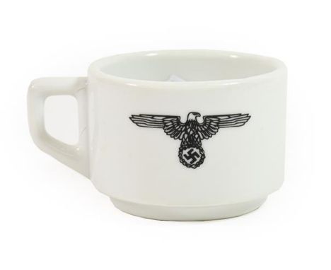 A German Third Reich Kolmar SS-Reich Mess Hall Coffee Cup, in white with black eagle and SS runes over EIGENTUM DER WAFFEN SS